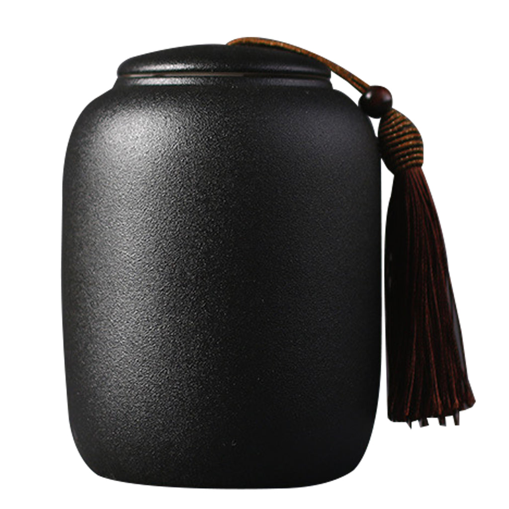 Matte black ceramic storage jar with lid, view 4