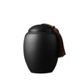 Matte black ceramic storage jar with lid, view 5