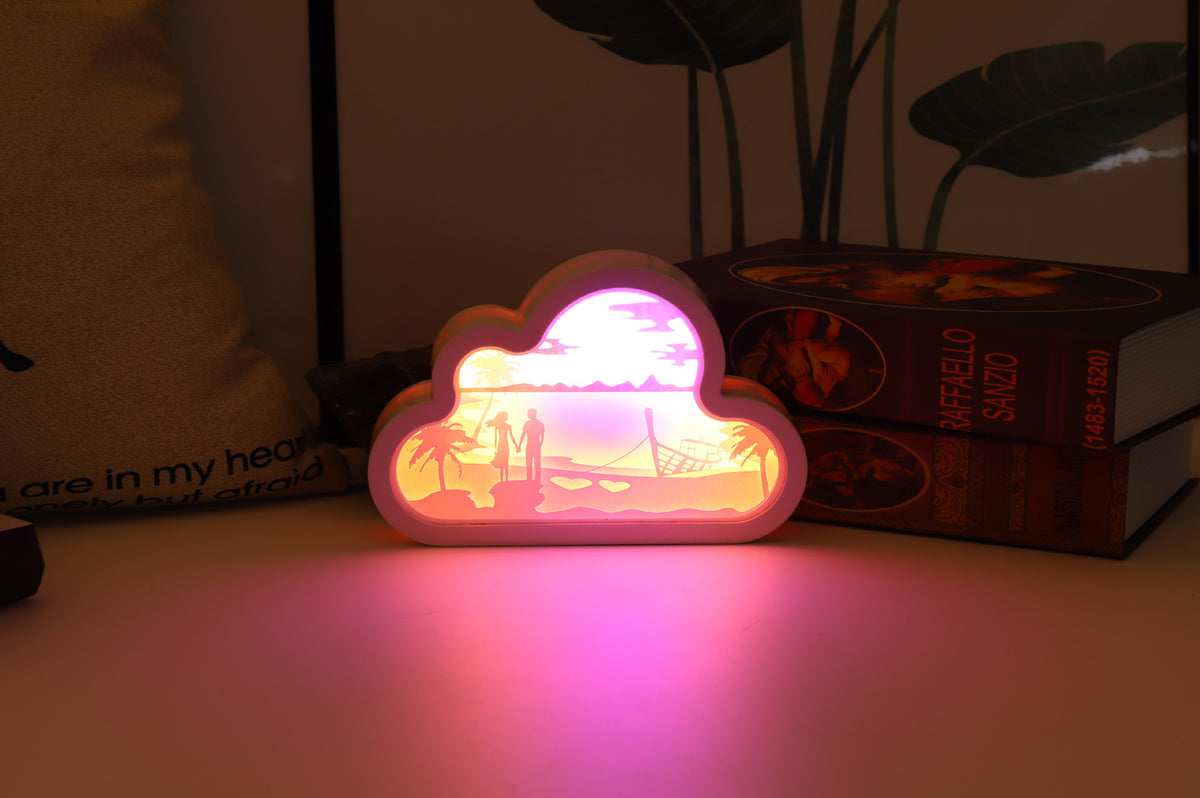 Cloud paper carving night light in romantic beach