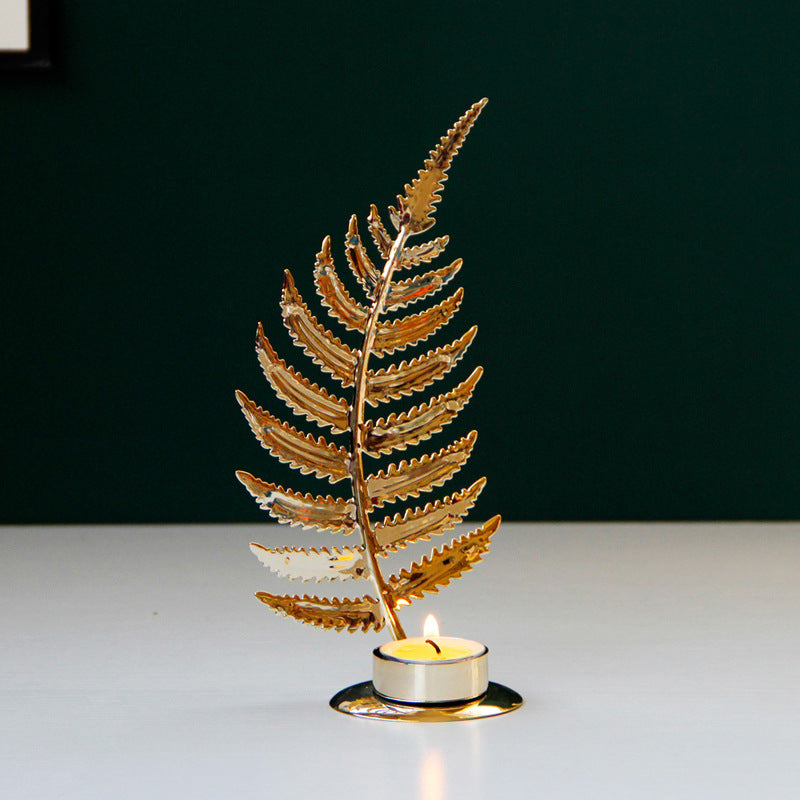Gold leaf metal candle holder – Fern Leaf (12.5cm) with lit tea light