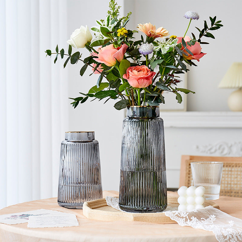 Ribbed glass flower vases with gold rim in Small and Medium styled with fresh roses