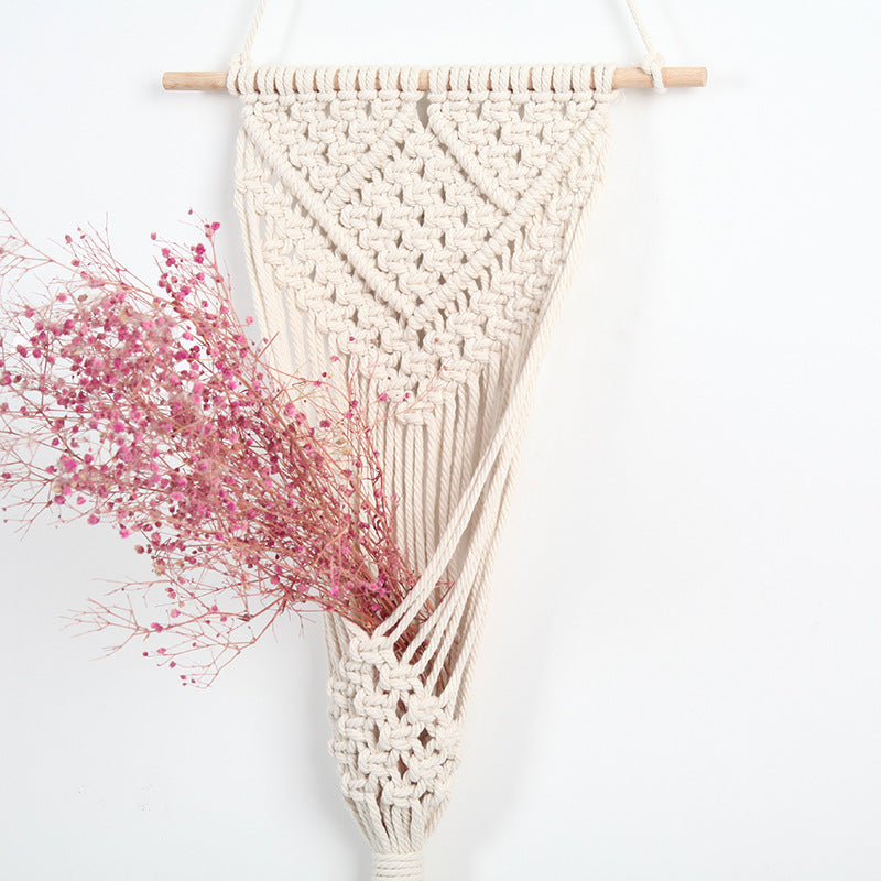Cream Macramé Wall Hanging Planter pocket styled with dried pink gypsophila flowers