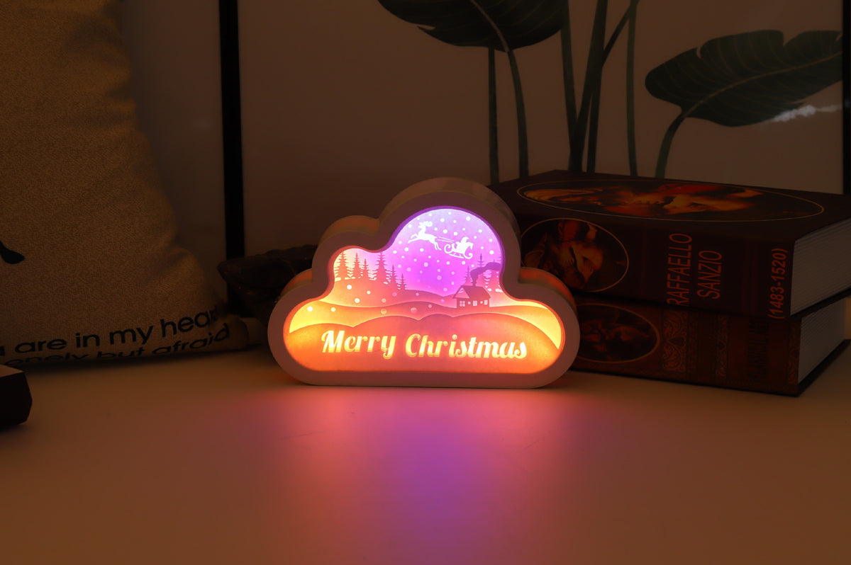 Cloud paper carving night light in merry christmas