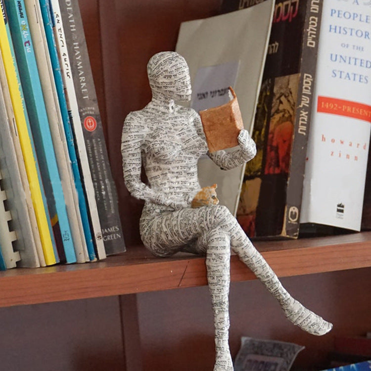 Reading woman resin statue in b