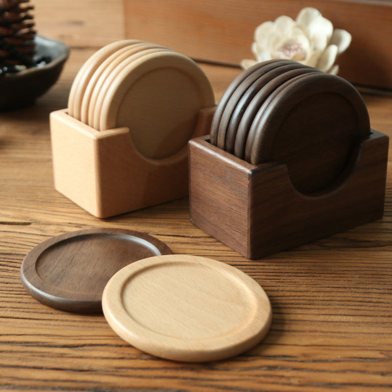 Solid beech and black walnut wooden coasters with raised rim detail