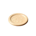 Minimalist wooden coaster in solid natural beech (9cm) showing water-resistant finish