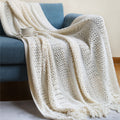 Knitted tassel throw blanket (127 × 180cm) in Beige with cable and lattice knit detail