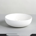 Minimal ceramic candle tray in matte white fluted porcelain (17.5cm)