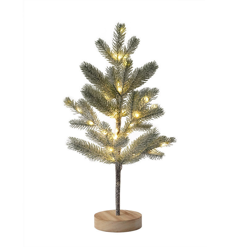 Frosted pine Christmas tree lamp on wooden base