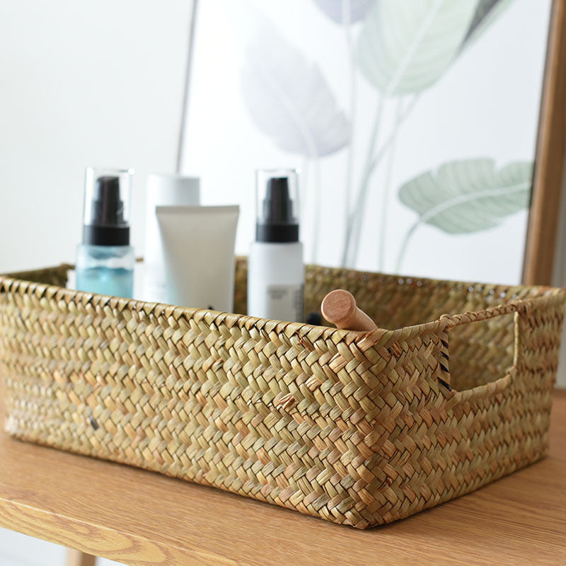 Seagrass basket holding skincare bottles